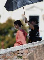 Lilly Collins Takes a Break While Filming Emily in Paris - Venice