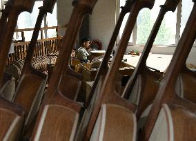 Factory of Traditional Chinese Musical Instruments - China