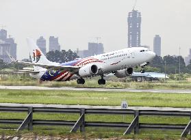 Japanese scam suspects in Cambodia deported to Japan