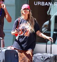 Heidi Klum and Kids Move to College Shop in Soho - NYC