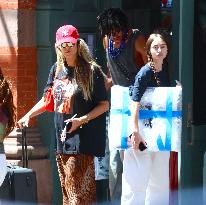 Heidi Klum and Kids Move to College Shop in Soho - NYC