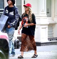 Heidi Klum and Kids Move to College Shop in Soho - NYC