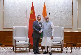 Narendra Modi Meets Chinese Foreign Minister Wang Yi - New Delhi