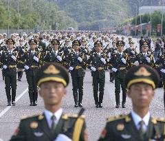 Chinese soldiers practice for military parade
