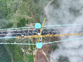 Load Testing on The Huajiang Grand Canyon Bridge - China