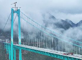 Load Testing on The Huajiang Grand Canyon Bridge - China
