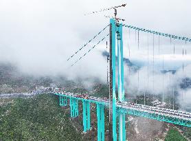 Load Testing on The Huajiang Grand Canyon Bridge - China
