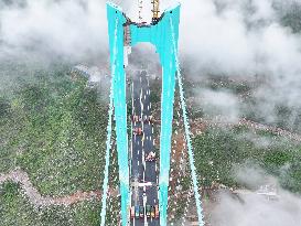 Load Testing on The Huajiang Grand Canyon Bridge - China