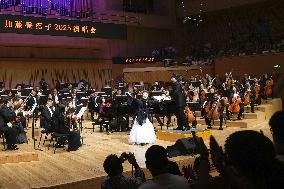 Singer Tokiko Kato sings in China