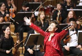 Singer Tokiko Kato sings in China