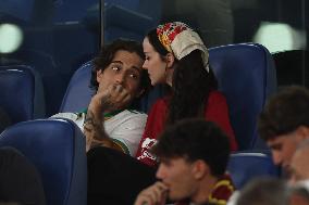 Damiano David And Dove Cameron Attending AS Roma v Bologna FC - Rome