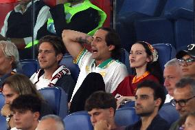 Damiano David And Dove Cameron Attending AS Roma v Bologna FC - Rome