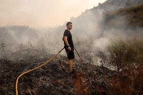 Wildfires Drive Evacuations in Leon