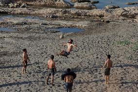Young Iraqis Swim In The River - Erbil