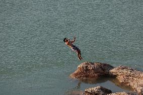 Young Iraqis Swim In The River - Erbil