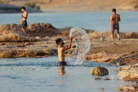 Young Iraqis Swim In The River - Erbil