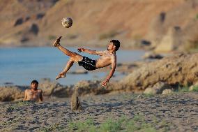 Young Iraqis Swim In The River - Erbil