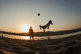 Young Iraqis Swim In The River - Erbil