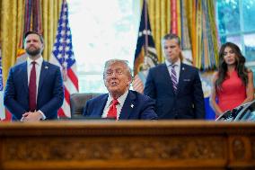 White House - Trump Signing Executive Order in The Oval Office