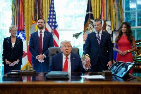 White House - Trump Signing Executive Order in The Oval Office