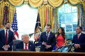 White House - Trump Signing Executive Order in The Oval Office