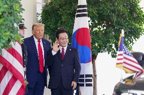 Donald Trump greets Lee Jae-myung - Washington
