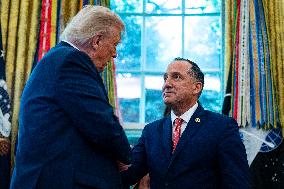 Trump Signs Executive Order In Oval Office - DC