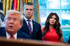 Trump Signs Executive Order In Oval Office - DC