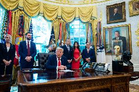 Trump Signs Executive Order In Oval Office - DC