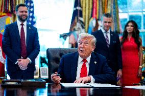 Trump Signs Executive Order In Oval Office - DC