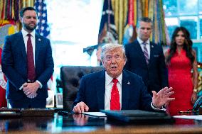 Trump Signs Executive Order In Oval Office - DC