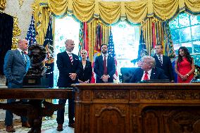 Trump Signs Executive Order In Oval Office - DC