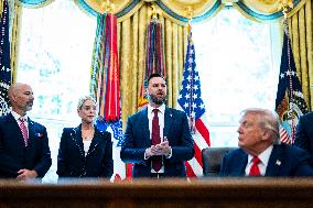 Trump Signs Executive Order In Oval Office - DC