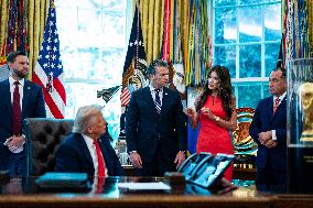 Trump Signs Executive Order In Oval Office - DC