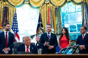 Trump Signs Executive Order In Oval Office - DC