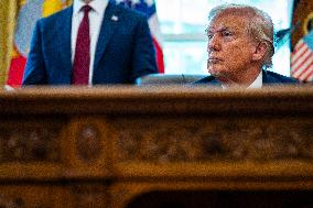 Trump Signs Executive Order In Oval Office - DC