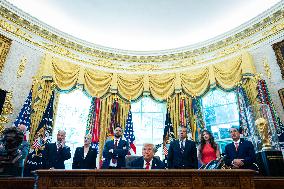 Trump Signs Executive Order In Oval Office - DC