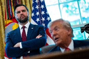 Trump Signs Executive Order In Oval Office - DC