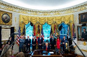 Trump Signs Executive Order In Oval Office - DC