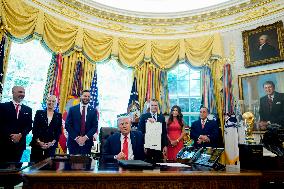 Trump Signs Executive Order In Oval Office - DC