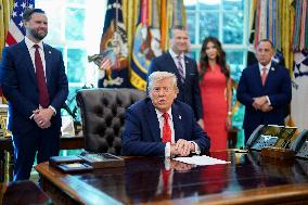 Trump Signs Executive Order In Oval Office - DC