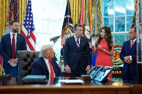 Trump Signs Executive Order In Oval Office - DC