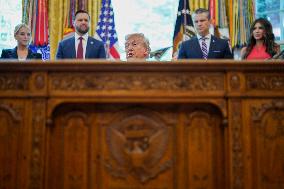 Trump Signs Executive Order In Oval Office - DC