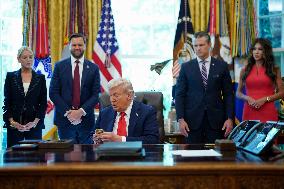 Trump Signs Executive Order In Oval Office - DC