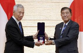 Japan PM Ishiba meets ex-Singapore PM Lee in Tokyo