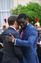 Emmanuel Macron welcomes Bassirou Diomaye Faye at the Elysee FA