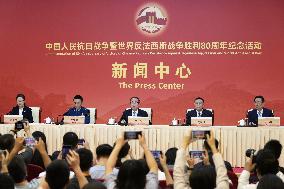 Chinese government officials at press conference