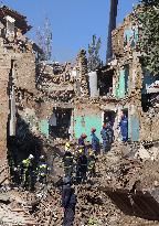 Missile-hit condominiums in Kyiv