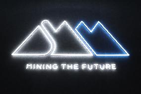 Sumitomo Metal Mining signboard and logo