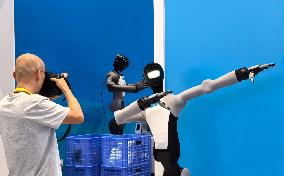 Robots Welcome World Media At The SCO - Tianjin